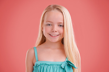 Image showing Girl, portrait and smile for growth in studio, child development and proud on pink background. Happy female person, kid and confident for childhood on backdrop, positive attitude and satisfaction