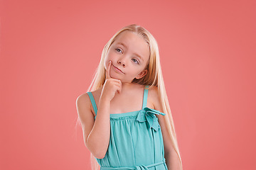 Image showing Thinking, ideas and girl child in studio with brainstorming facial expression by mockup space. Planning, question and young kid model with guess, decision or choice face isolated by pink background.