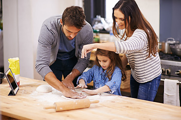 Image showing Happy, family and child hands in kitchen, marriage couple and female person baking in home. Father, mama helping make dough with flour on counter, parents and kid together for bonding with love