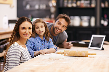 Image showing Portrait, mother and father with child to bake in a kitchen teaching for help, support or learning in home. Family, tablet or girl cooking bread with parents, dad and mom for dinner, supper or lunch