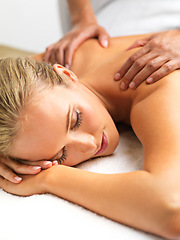 Image showing Zen, hands and woman with back massage at spa for wellness, health and self care. Calm, relax and happy female person sleeping with masseuse for body skin treatment or therapy at beauty salon.