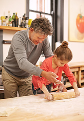 Image showing Cooking, rolling pin or grandfather with child in kitchen teaching a recipe for support or learning in home. Family, baking or girl with bowl, grandpa or senior man for dinner, supper or lunch meal