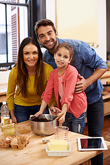 Image showing Parents, kid and baking with tablet for recipe online with ingredients for cake or dessert with support and handmade. Mom, dad and girl child in kitchen together with love for bonding or teaching.