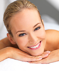 Image showing Woman, smile in portrait and massage at spa for peace and treatment, destress and wellness with acupressure at luxury resort. Happy, stress relief and self care with service for holistic healing