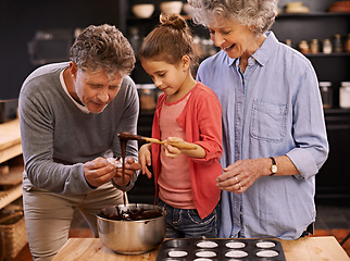 Image showing Teaching, baking and grandparents with girl, help and ingredients with hobby and bonding together. Family, old man and senior woman with grandchild and utensils with recipe and activity in a kitchen