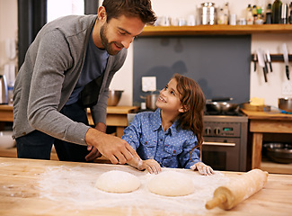 Image showing Father, kitchen and happy child baking, helping and dough with flour on counter table, parent together and smile. Family home, cooking activity and fun bonding for meal preparation with utensil