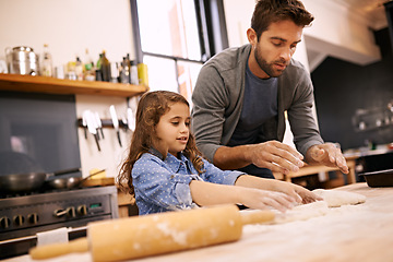 Image showing Pizza, dough and child with father in kitchen and teaching recipe and learning to meal prep food. Cooking, together and girl helping with rolling pin, flour and baking with dad in home for dinner