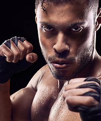 Image showing Fitness, portrait and man boxer in studio for power, resilience and training on black background. Fighter, hands by face of sweaty kickboxing male at gym for wellness, exercise or energy workout