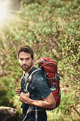 Image showing Man, hiking and nature for adventure, health and wellness with view and mountain. Athlete, exercise and fitness with summer, sunshine and backpack journey on cape town trail with travel and vacation