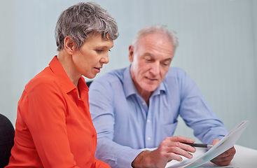 Image showing Documents, planning and senior woman with financial advisor in discussion for pension fund in office. Conversation, paperwork and elderly female person with finance consultant for retirement savings.