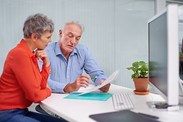 Image showing Paperwork, planning and senior woman with financial advisor in discussion for pension fund in office. Conversation, documents and elderly female person with finance consultant for retirement savings.