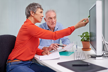 Image showing Computer, team and mature business people brainstorming, discussion or planning research with documents in office. CEO, man and woman in collaboration on desktop for project of financial consultants