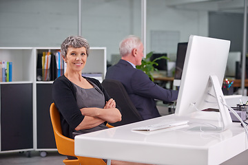 Image showing Business, mature and portrait of confident woman in office with male colleague, senior management or supervisor for corporate company. Person, pc and coworker in workplace, together and professional.