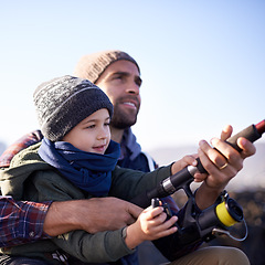 Image showing Water, father and son fishing bonding, outdoor and dad teaching boy in lake or pond together. Parent, male person and man with kid for nature in countryside for peace, happiness and smile of child