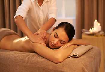 Image showing Peace, back massage and female person at spa, treatment and wellness for holistic care. Calm, spine and muscle tension relief with reflexology for relax, beauty salon and masseur for body health