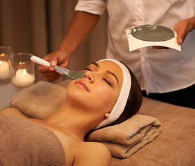 Image showing Woman, skincare and application of face mask by beautician for detox, smooth skin and dermatology. Esthetician, client and beauty product at luxury spa for collagen, natural facial and cosmetics