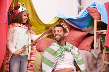 Image showing King, play or dad with princess in home in a bedroom fort with crown costume, girl or parent. Family castle, happiness or smile with a knight, father or an excited child in a dress up or sword game