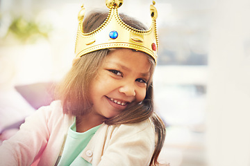 Image showing Smile, girl or princess with crown in portrait, home or castle with queen costume or royal tiara. Play, happiness or face of a child or kid ready for dress up, development or fantasy game in a house