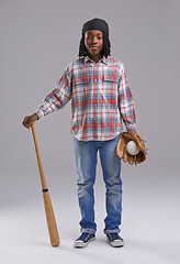 Image showing Baseball, portrait and child in a studio with game, sport and fitness gear with a kid. Youth, equipment and African boy with modern and casual fashion with workout glove and teen with grey background