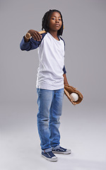 Image showing Baseball, portrait and child in a studio with fashion, sport and fitness gear with confidence of kid. Youth, athlete and African boy with modern, casual and hipster style with workout glove and teen