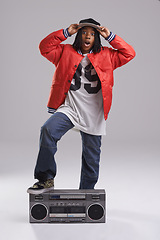 Image showing Child, hip hop and wow portrait with radio for music and rap in a studio with urban clothing. Fashion, African kid and boombox with trendy clothes and youth swag with confidence and grey background