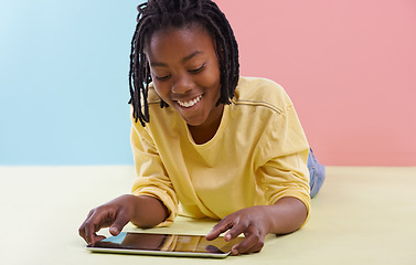 Image showing Tablet, search and happy boy child on floor with social media, ebook or cartoon at home. Digital, smile or African teen person with app for Netflix and chill sign up, google it or gaming subscription