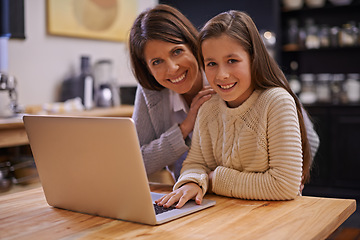 Image showing Mother, portrait and child with laptop in kitchen for learning, support or care at home. Happy mom, daughter or kid with smile on computer for social media, trust or bonding together at the house