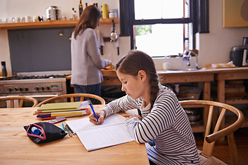 Image showing Girl, kid and homework with studying in kitchen with writing, development or notes for education in house. Child, notebook and thinking with learning, language and ideas for assessment in family home