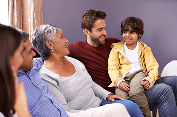 Image showing Grandparents, father and kid on sofa in home for bonding, relationship and relax together. Big family, happy and senior parents, dad and young child for holiday, laughing and weekend in living room