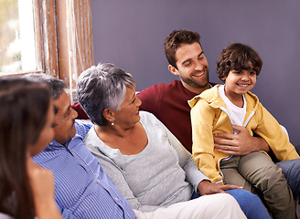 Image showing Happy grandparents, parents and children on sofa for bonding, relationship and relax together. Senior generation, family and mother, father and young boy for holiday, vacation and weekend in home