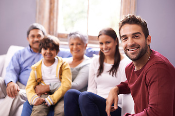 Image showing Portrait of grandparents, parents and kid in home for bonding, relationship or relax together. Family, happy and mom, father and kids with senior generation on sofa for holiday, vacation and weekend