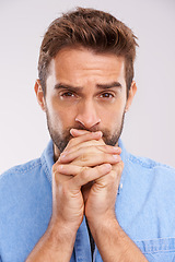 Image showing Anxiety, stress and man portrait in studio nervous for results, outcome or suspense on white background. Overwhelmed, worry and male model face with panic expression, overthinking or waiting gesture