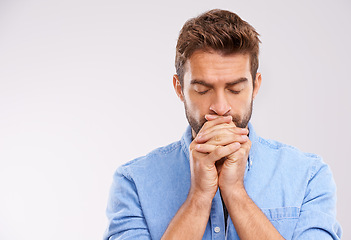 Image showing Man, praying and worship with hope and faith in God, seek help and advice for guidance on white background. Spiritual, religion and gratitude with thanks, prayer and forgiveness with belief in studio