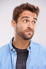 Image showing Thinking, confused and man with ideas, choice and emotion on white studio background with solution and emoji. Person, model and guy with decision and question with why, reaction and unsure doubt