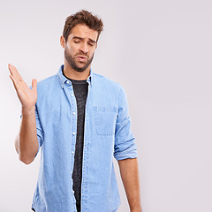 Image showing Smell, man and waving his hands for bad stink, poor hygiene and negative aroma on white studio background. Face, person or model with gesture or body odor with fart and disgust with yuck expression