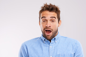 Image showing Time for bed. Man, portrait and yawn, tired in studio and burnout with facial expression and insomnia on white background. Face, open mouth and fatigue with exhaustion, overworked and sleepless.