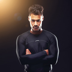 Image showing Fitness, portrait and man in studio with confidence, serious and workout for health, wellness and power. Arms crossed, pride and strong athlete on black background for exercise, results and care
