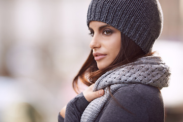 Image showing Woman, cozy and fashion with beanie, cold and winter for comfort and warm. Designer, gen z and urban with trendy, style and autumn jacket with knit scarf and attitude for cool weather and relaxation