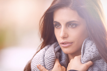 Image showing Woman, cozy and fashion with scarf, cold and winter for comfort and warm. Designer, gen z and urban with trendy, style and autumn jacket with knit clothing and attitude for cool weather or relaxation