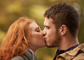 Image showing Couple, kiss and outdoor for romance and passion for romantic, dating and relationship together. Boyfriend, girlfriend and young people with eyes closed for adoration, happy and love for bonding