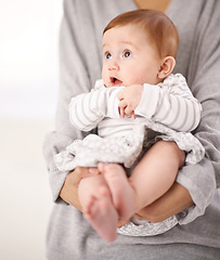 Image showing Family, love and mother with baby for safety, comfort and adoption of newborn girl at home. Relax, care and parent with infant in house with support, peace and thinking for development of curiosity