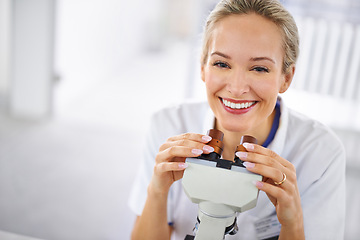 Image showing Happy woman, portrait and research scientist with microscope exam, test or scientific discovery at laboratory. Face of female person or medical expert with smile or scope for breakthrough in biology