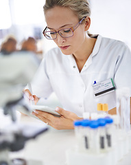 Image showing Reading, research and woman with tablet in medical laboratory with development in biotechnology. Scientist, typing or check results online of pharmaceutical report or review of innovation in science