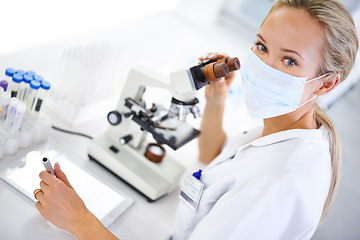 Image showing Medical, research and woman with tablet and microscope in lab with development in biotechnology. Scientist, typing or check results pharmaceutical report or review data of innovation in science