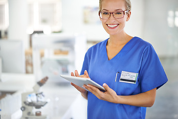 Image showing Medical, research and portrait of woman with tablet in laboratory with development in biotechnology. Doctor, typing or check results online of pharmaceutical report or review of innovation in science