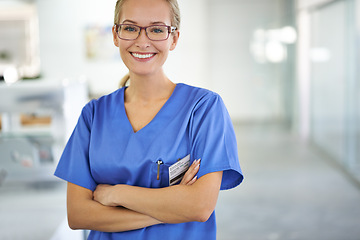 Image showing Happy woman, portrait and professional nurse with arms crossed at laboratory for healthcare or science. Young female person or medical researcher in confidence for PHD or career ambition at the lab