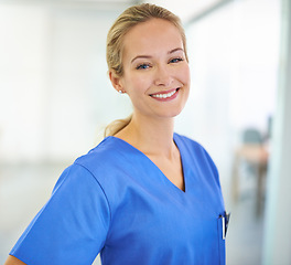 Image showing Portrait, healthcare and happy woman nurse in hospital for help, internship or friendly service. Health, face and female medical student at a clinic for emergency assistance, treatment or surgery