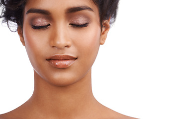 Image showing Eyes, beauty and Indian woman in studio for makeup glamour, cosmetics or wellness on white background. Face, calm or female model with glowing skin, results or cosmetology, shine or satisfaction