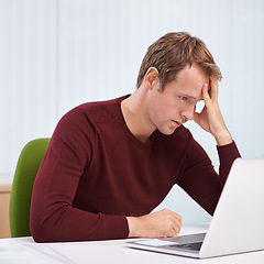 Image showing Tired, headache and business man on laptop with challenge, email or stress in startup office. Migraine, fatigue and worker on computer with financial crisis, fail or mistake of creative copywriter