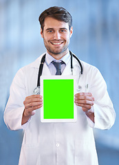 Image showing Doctor, smile and portrait with tablet for green screen, marketing and healthcare for advertising, present or advice for info. Young person and happy with presentation on tech for online and internet